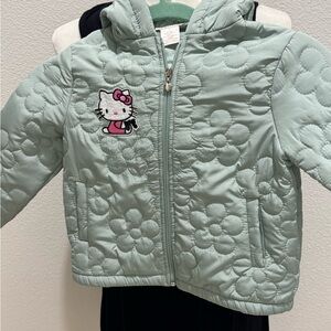 Girls Size 4 hooded lightweight puffer jacket green with Hello Kitty appliqué